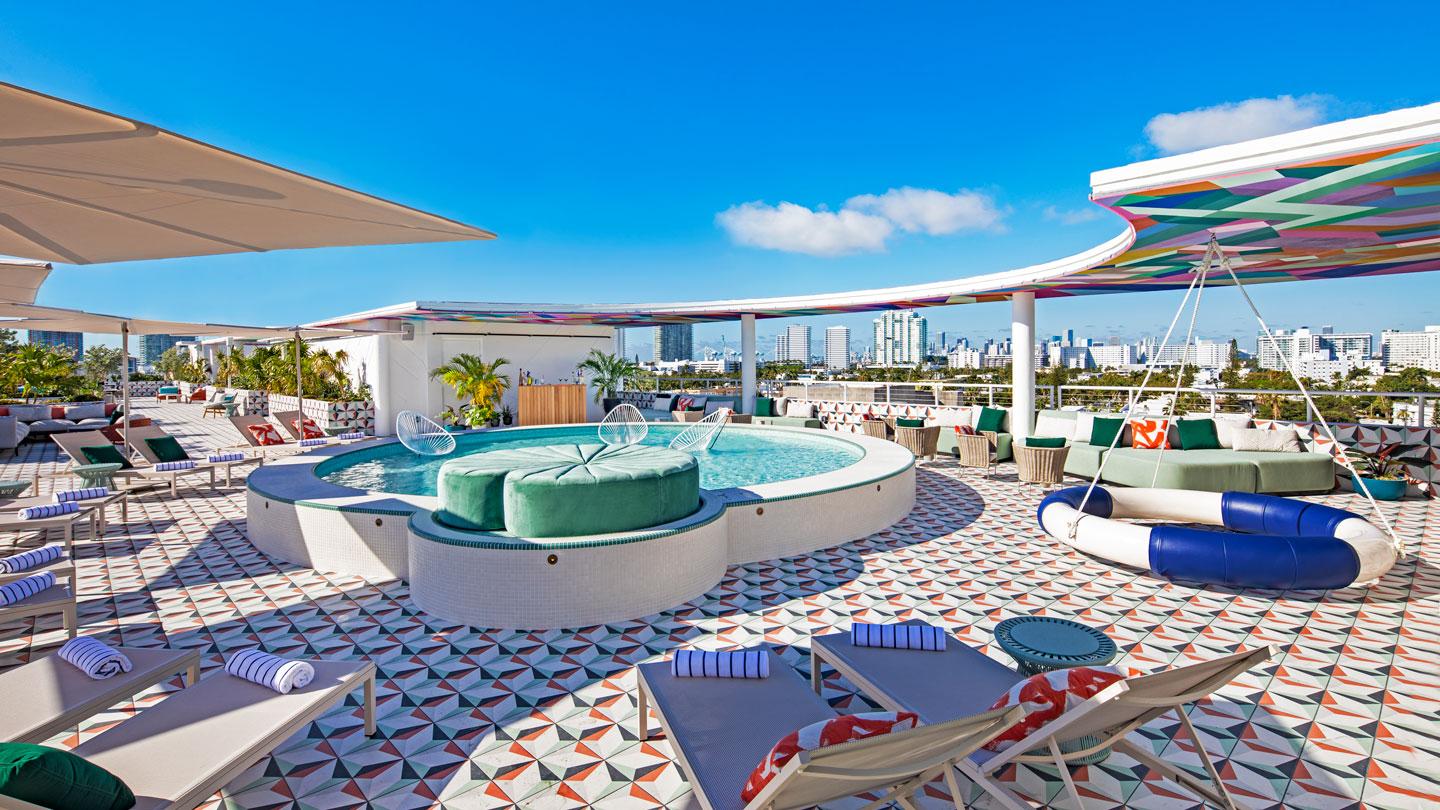 View of Moxy South Beach's rooftop lounge sunset.
