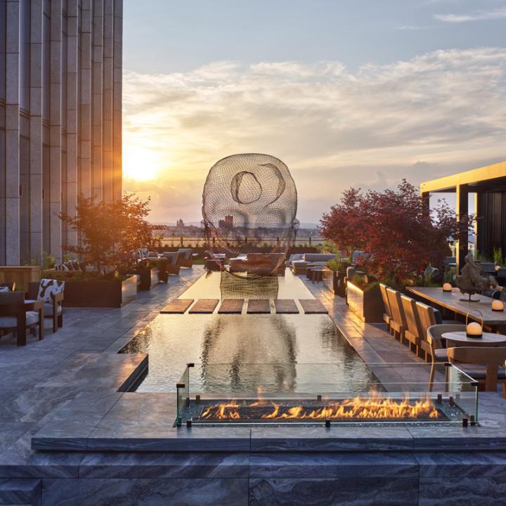 Outdoor terrace and reflecting pool at Equinox Hotel designed by Rockwell Group in New York City