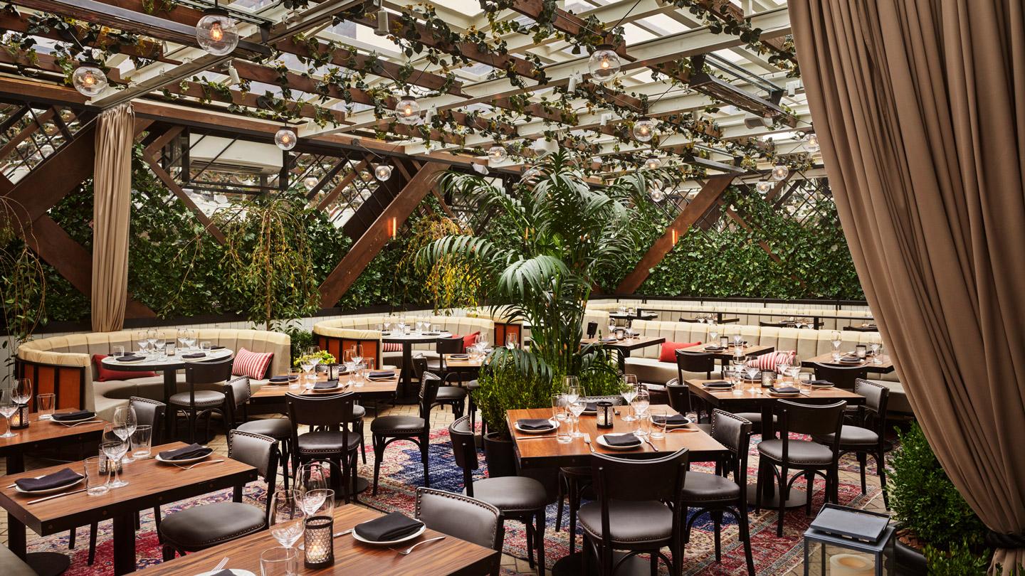 Dining courtyard at CATCH Steak designed by Rockwell Group architects in New York City