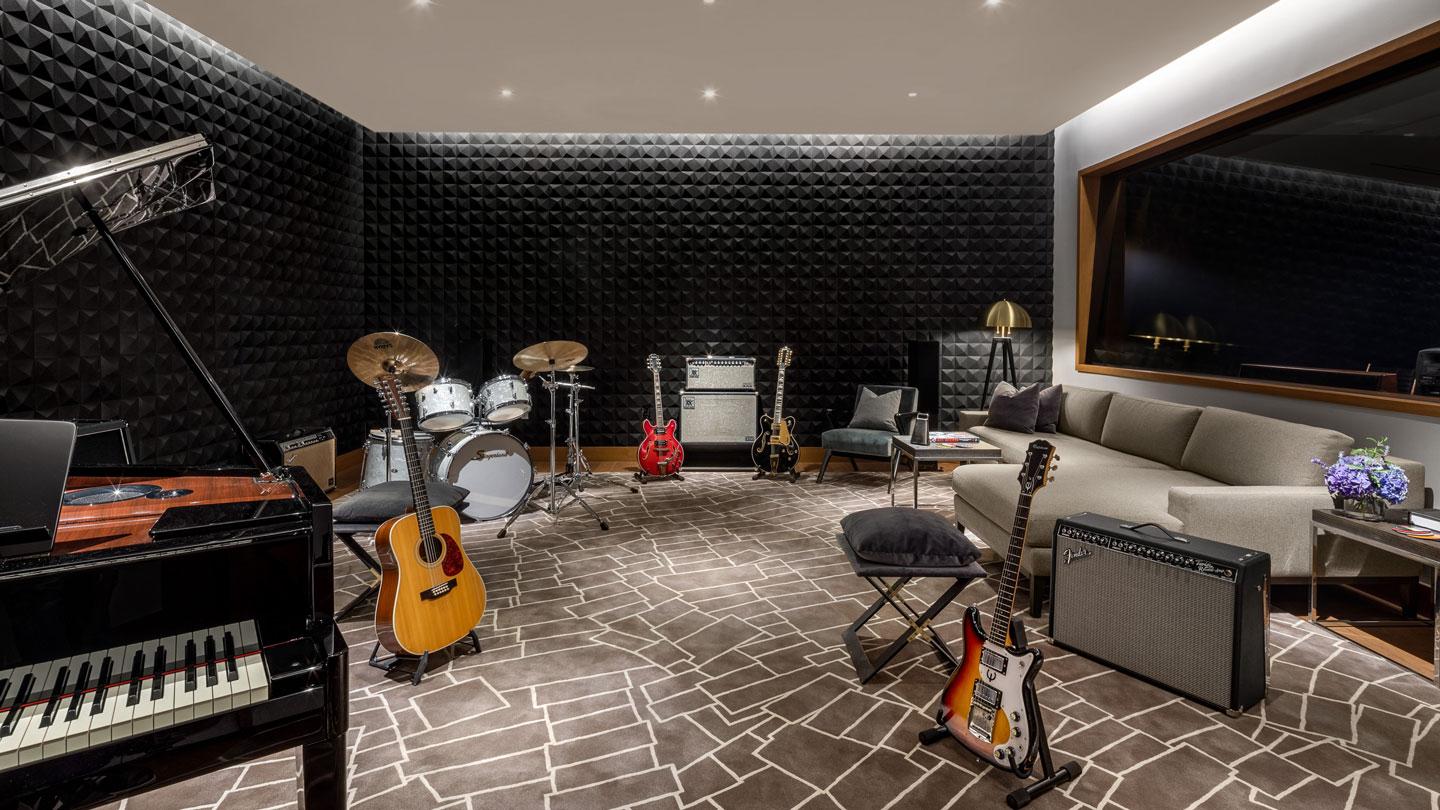 A music room studio with instruments at the Waterline Club designed by Rockwell Group