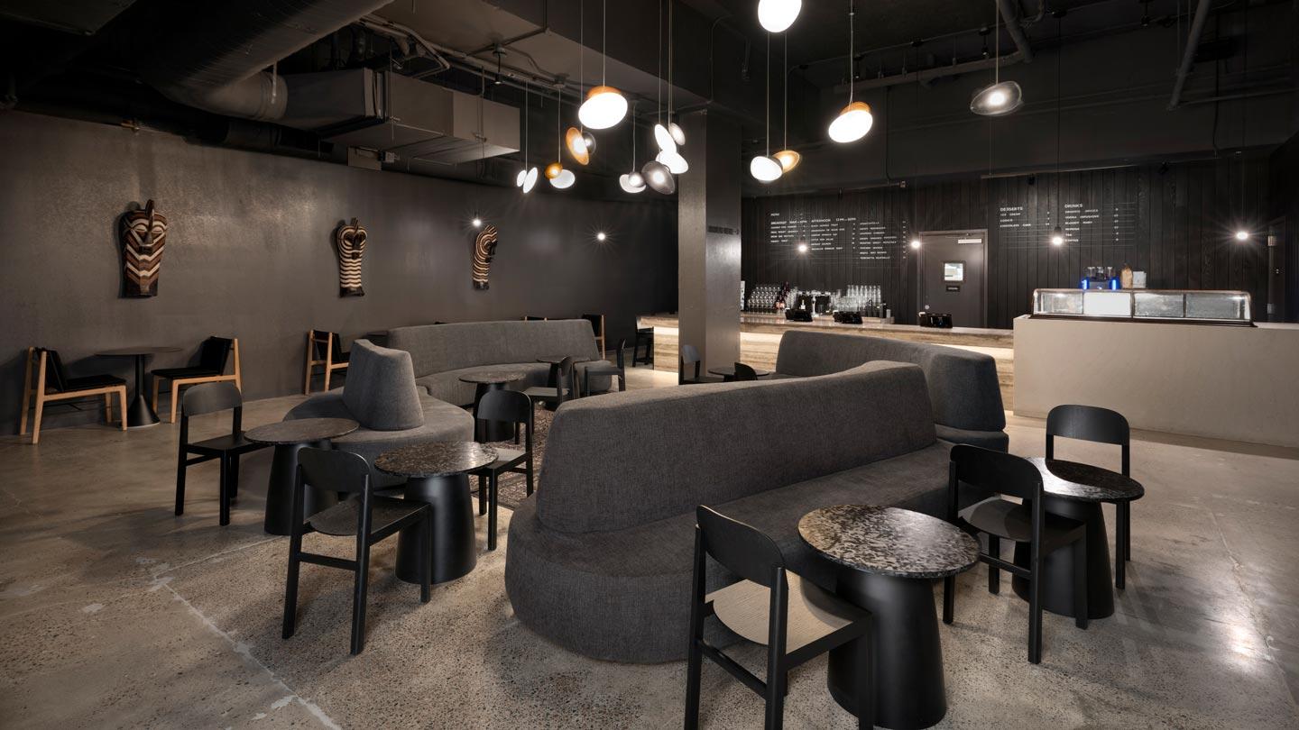 cafe with modular sofas at bathhouse flatiron, spa