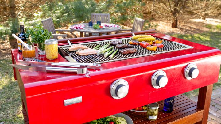 food cooking on outdoor caliber grill, product design
