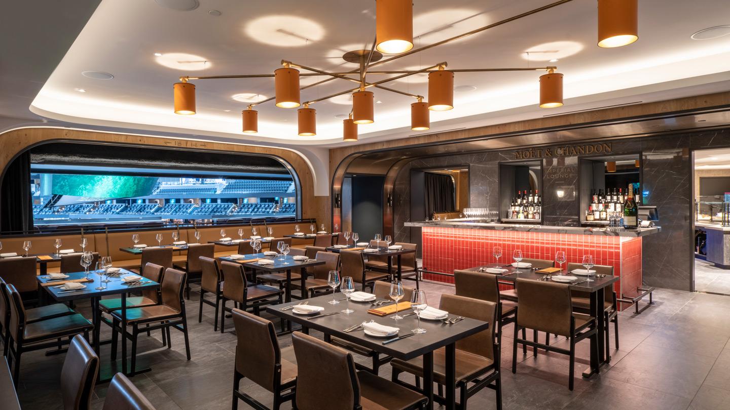 Metropolitan Club restaurant's dining room and bar at Climate Pledge Arena, Seattle, interior design