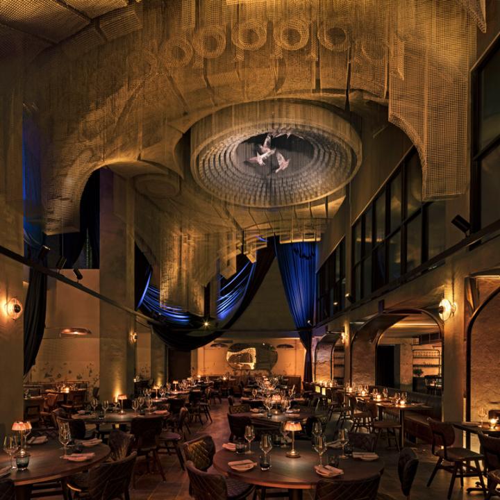 Cathedrale's triple-height main dining room designed by architecture firm Rockwell Group