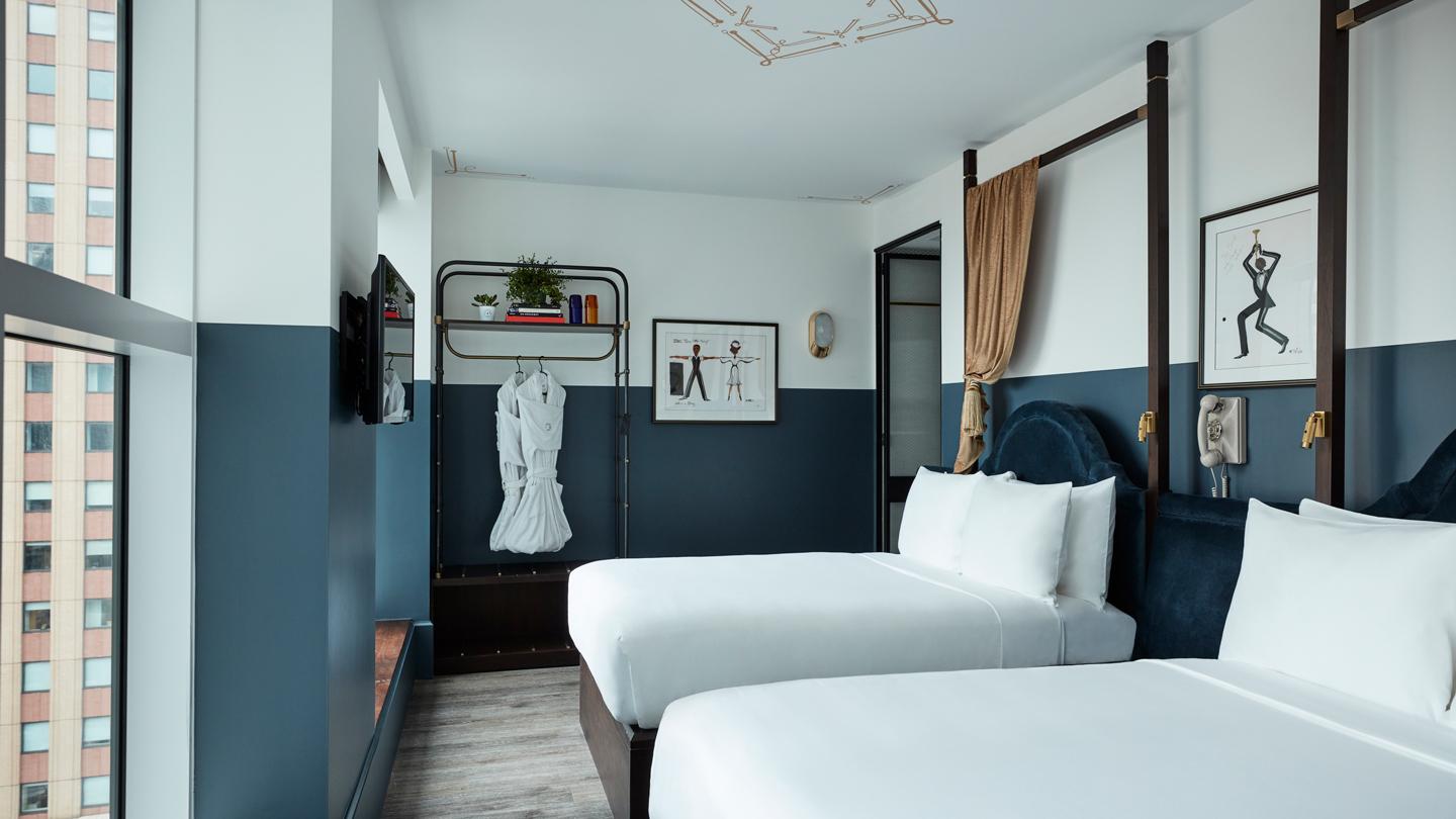 Intimate guestrooms in shades of either blue or bordeaux have an old-school dressing room feel. 
