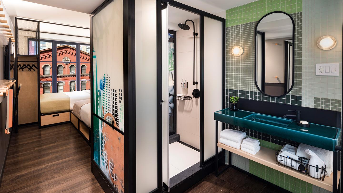 Moxy East Village guestroom designed by Rockwell Group