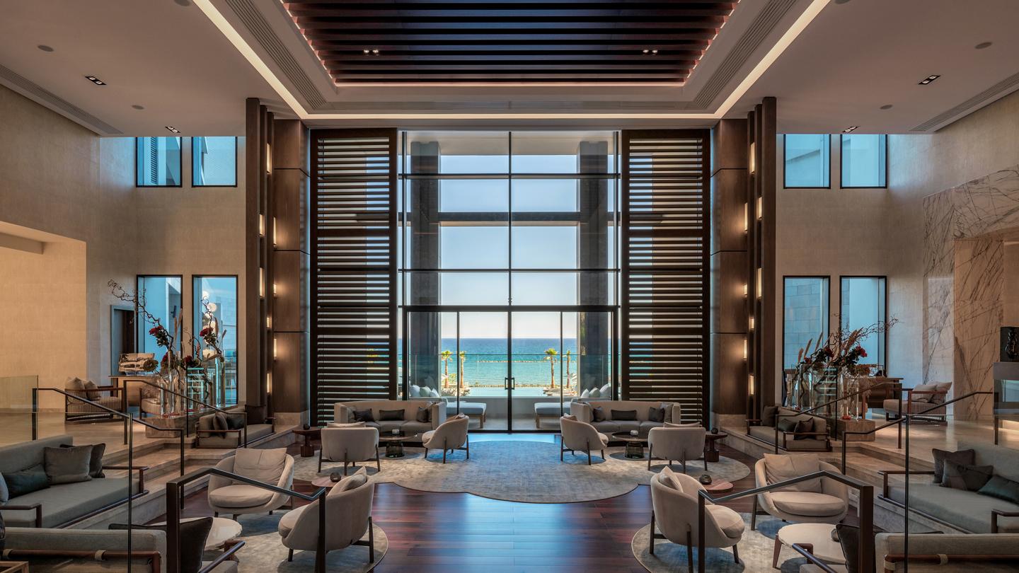 AMARA Hotel's lobby and lounge overlooking the ocean, hospitality design