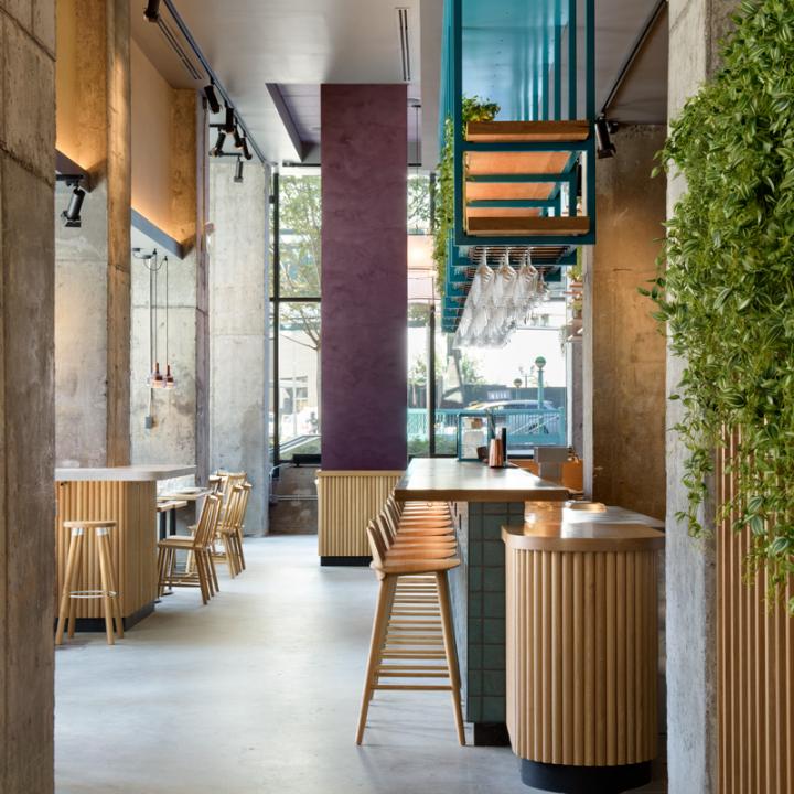 View of the bar inside Murray's Cheese Shop LIC designed by Rockwell Group