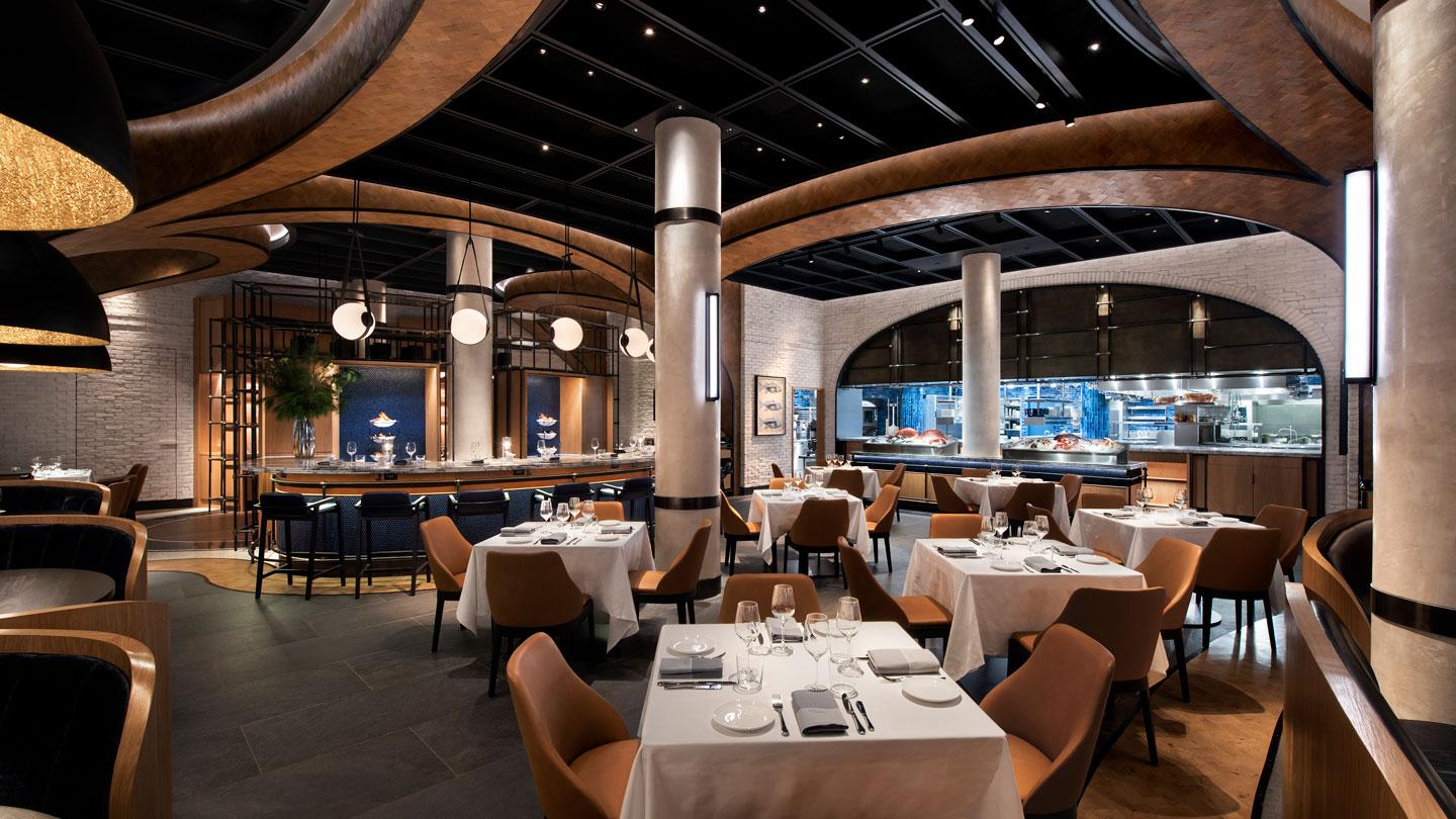 Oceans New York seafood restaurant's main dining room and open kitchen designed by Rockwell Group