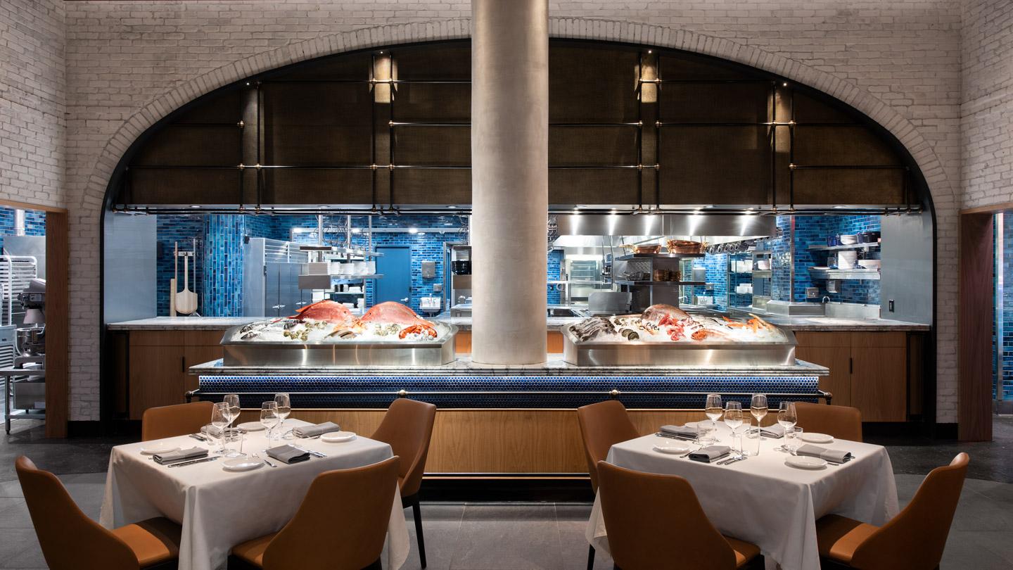 Oceans New York seafood restaurant's open kitchen designed by Rockwell Group architects.