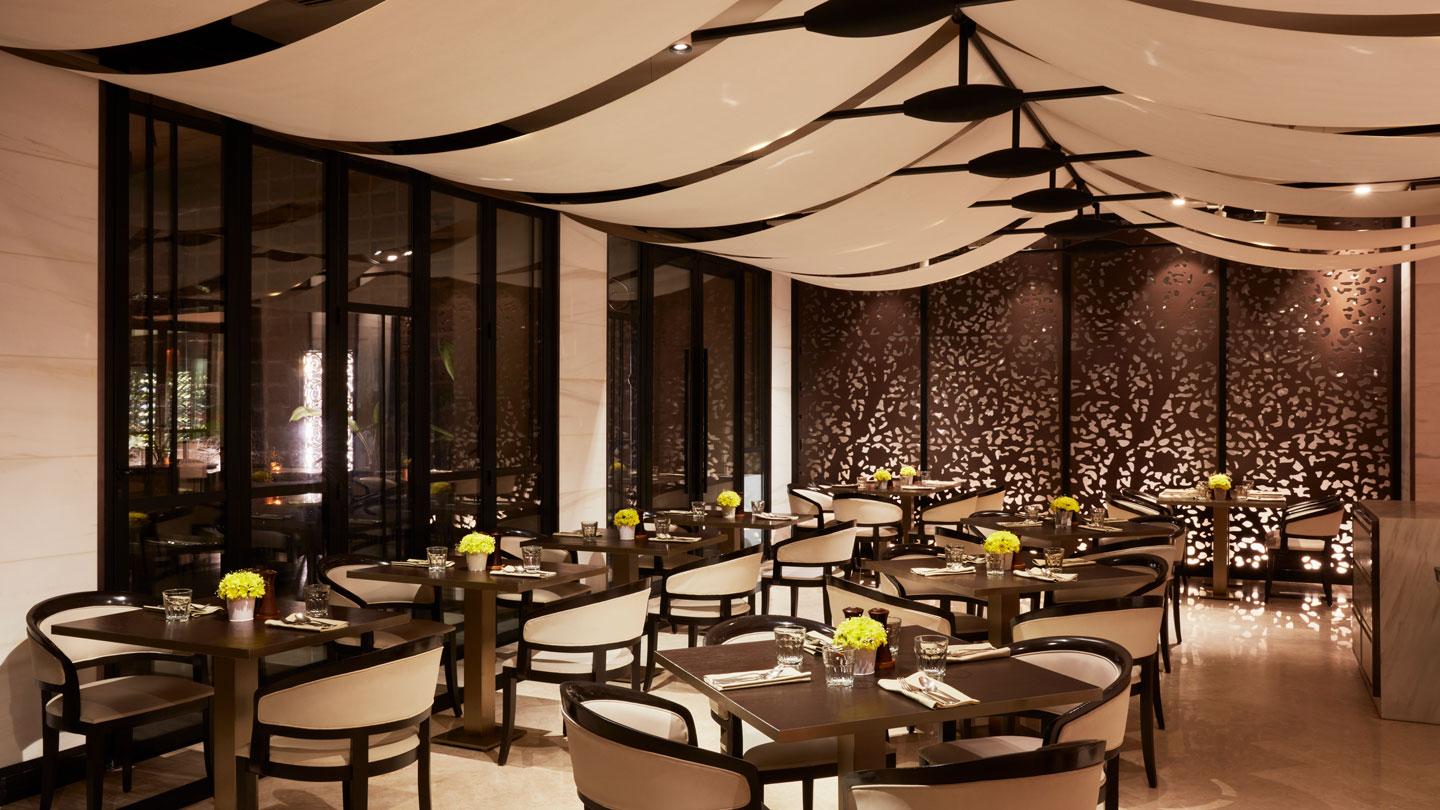 The all-day dining restaurant at the Taj Mahal Palace designed by Rockwell Group in India.