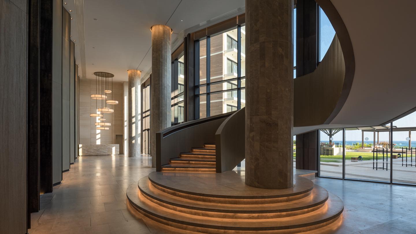 Winding staircase at Amara Hotel in Cyprus, hospitality design