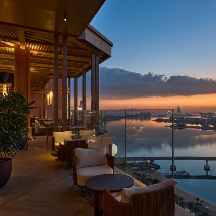 nobu dubai restaurant sushi bar interior rockwell group design hospitality terrace sunset